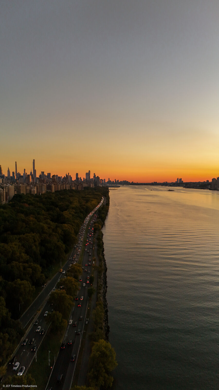 Aerial drone photograph over the New York coastline at golden hour, captured by JCF Timeless Productions