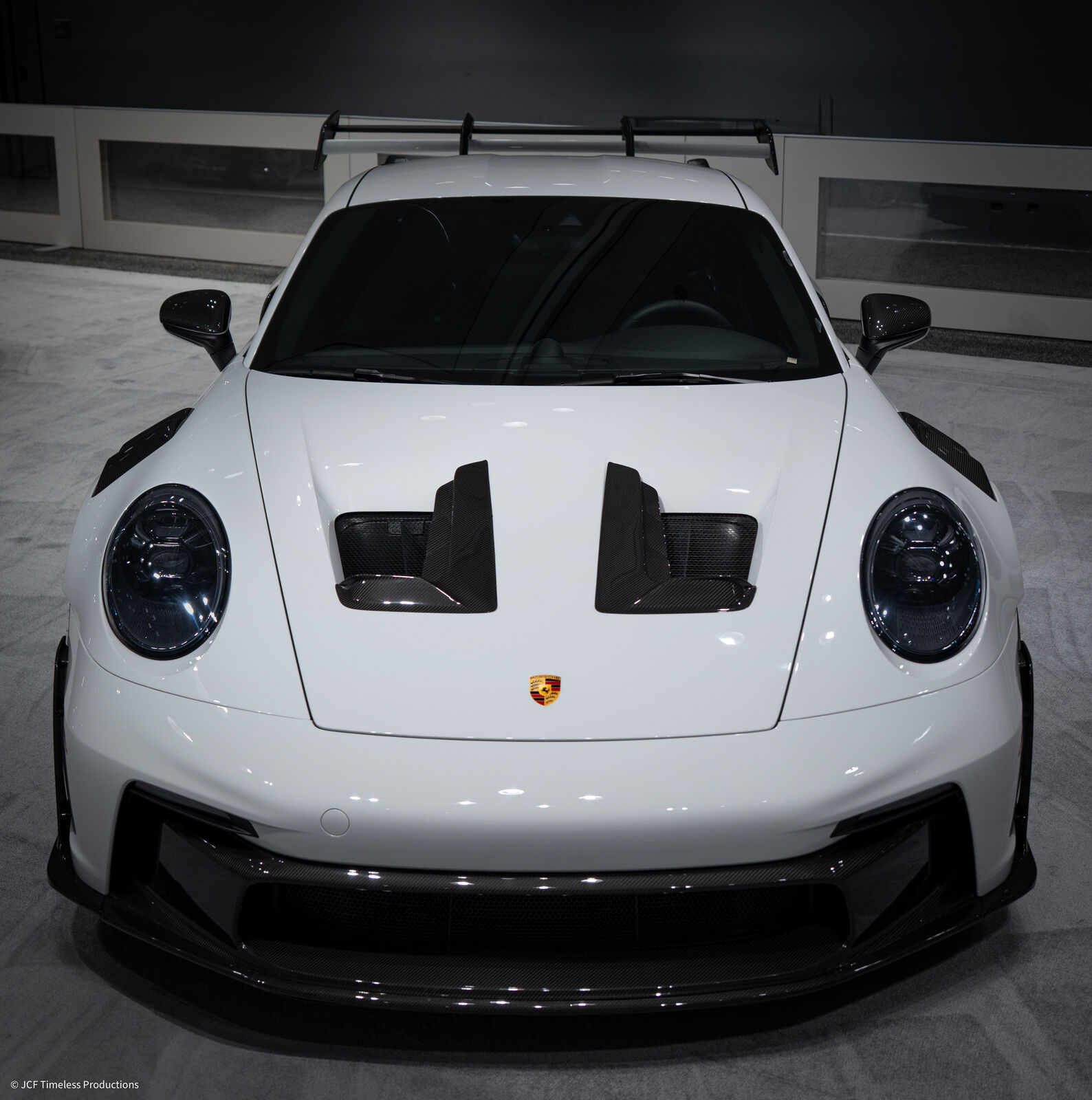 Automotive photograph with dramatic studio-style lighting on vehicle bodywork