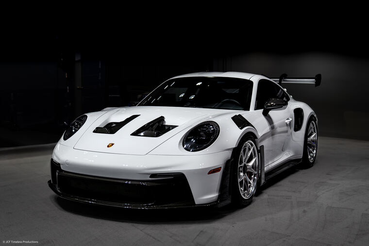 Automotive photograph with dramatic lighting on bodywork