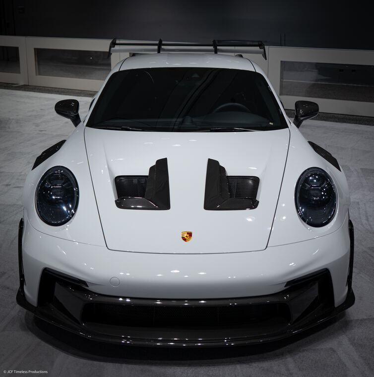 Automotive photograph with dramatic lighting on bodywork