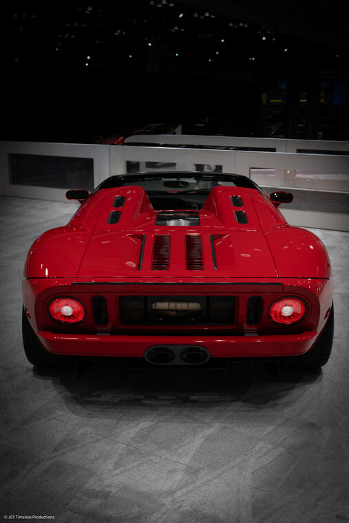 Automotive photograph with dramatic lighting on bodywork