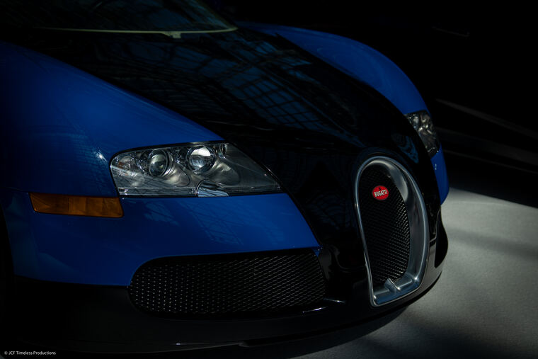 Automotive photograph with dramatic lighting on bodywork