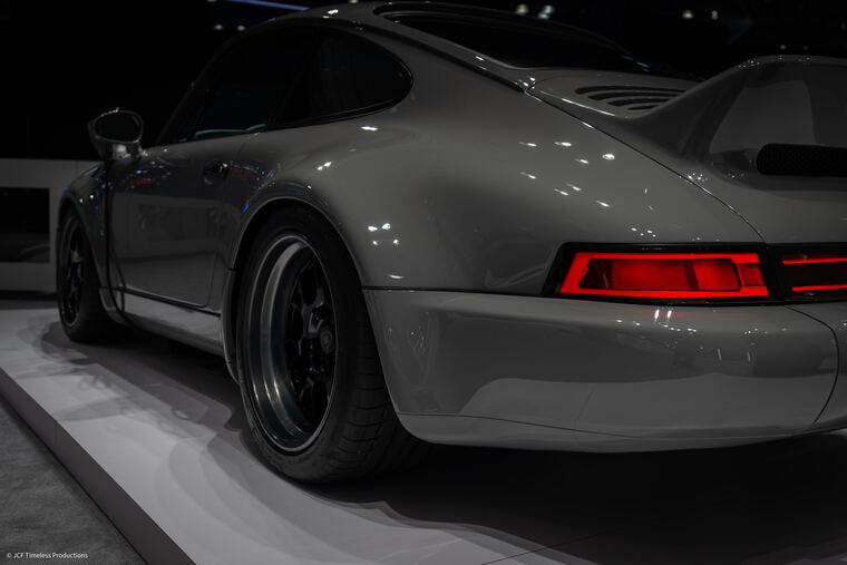 Automotive photograph with dramatic lighting on bodywork